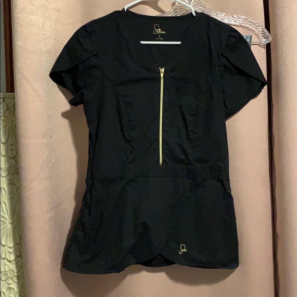 Jaanuu Peplum Scrub Top